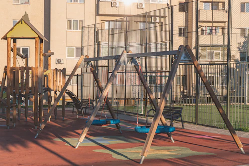 Wooden climbing and play structure in a park