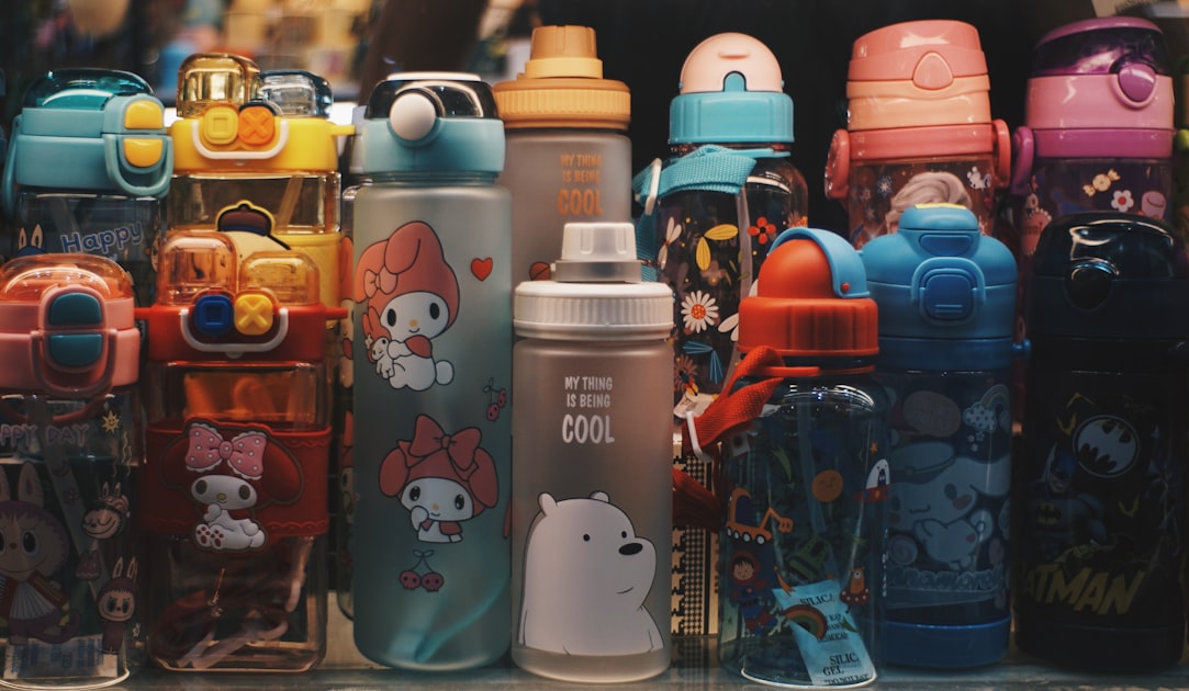 Collection of colorful cartoon character water bottles