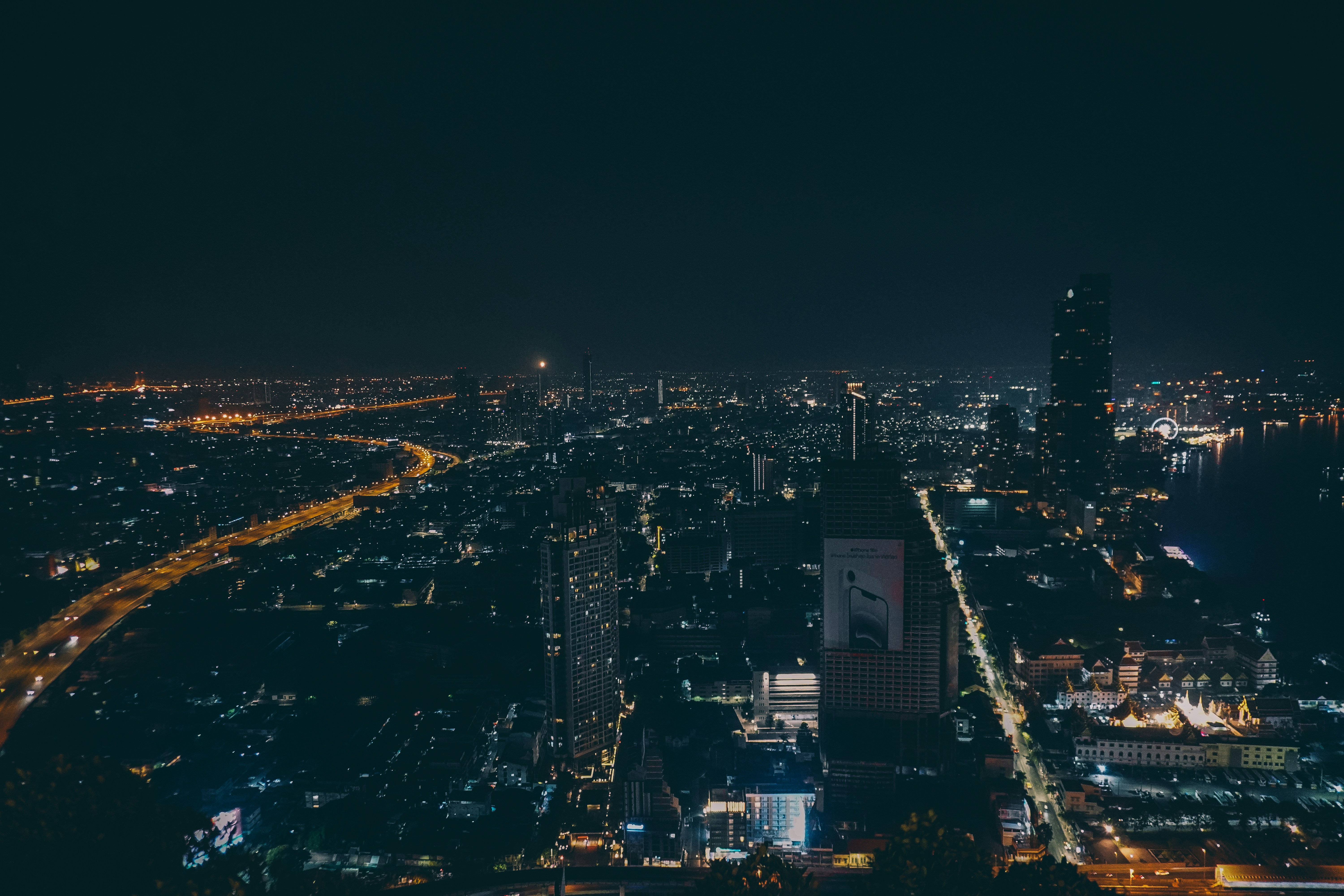 Vibrant cityscape at night with glowing lights