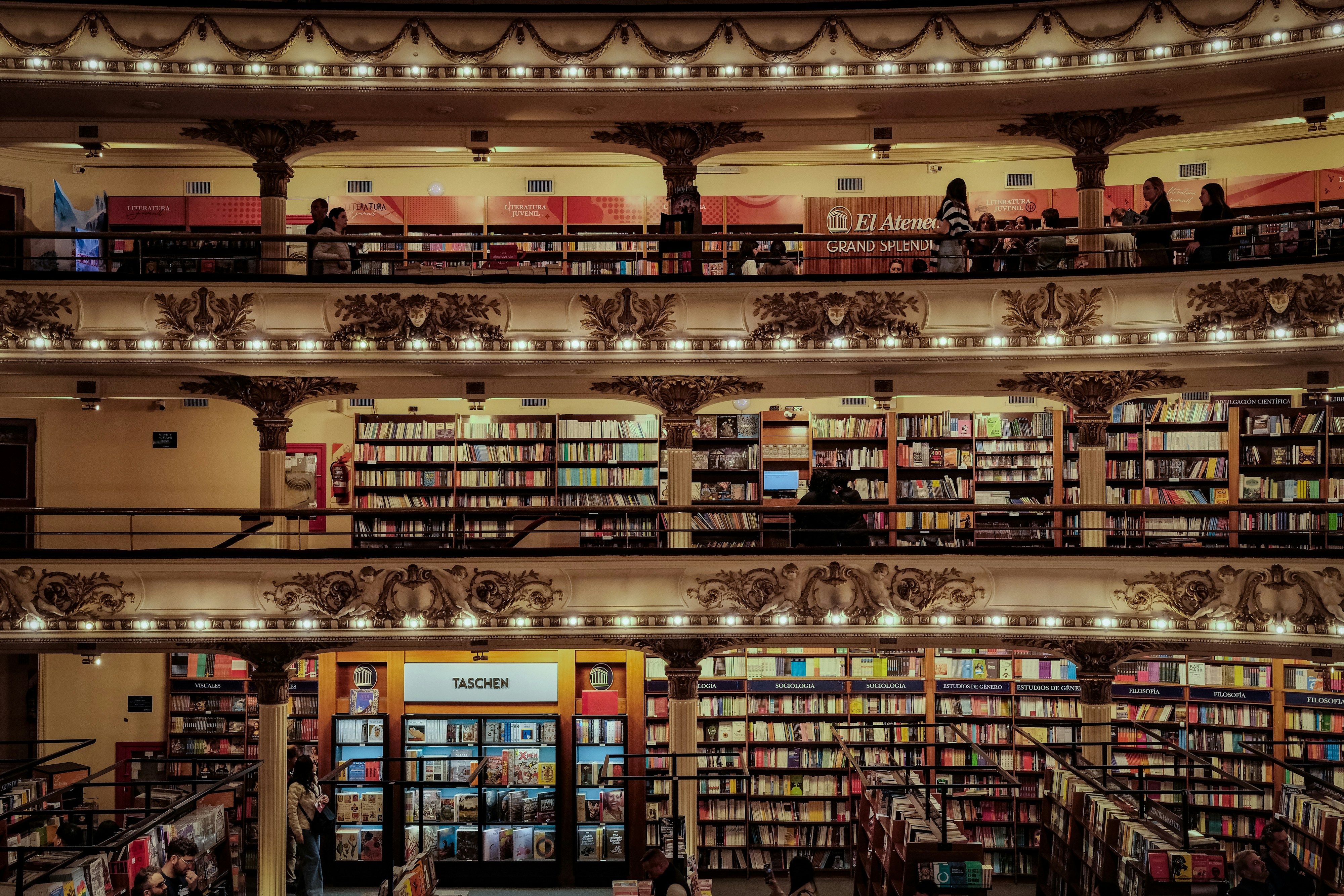Interior of a multi-level bookstore with many shelves.