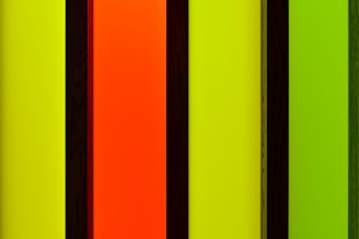 Vertical stripes of yellow, orange, and green.