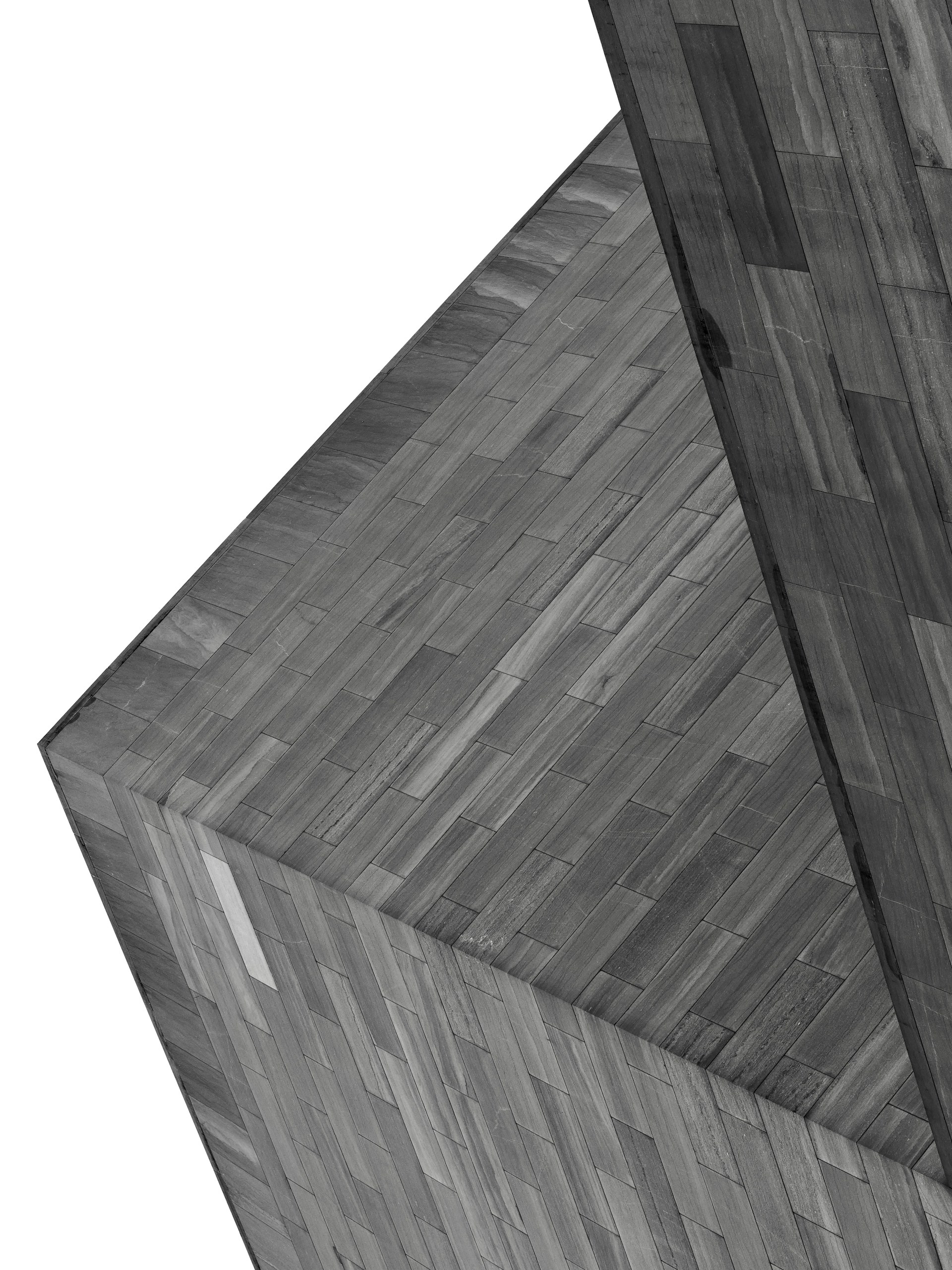 Geometric concrete structures against white background