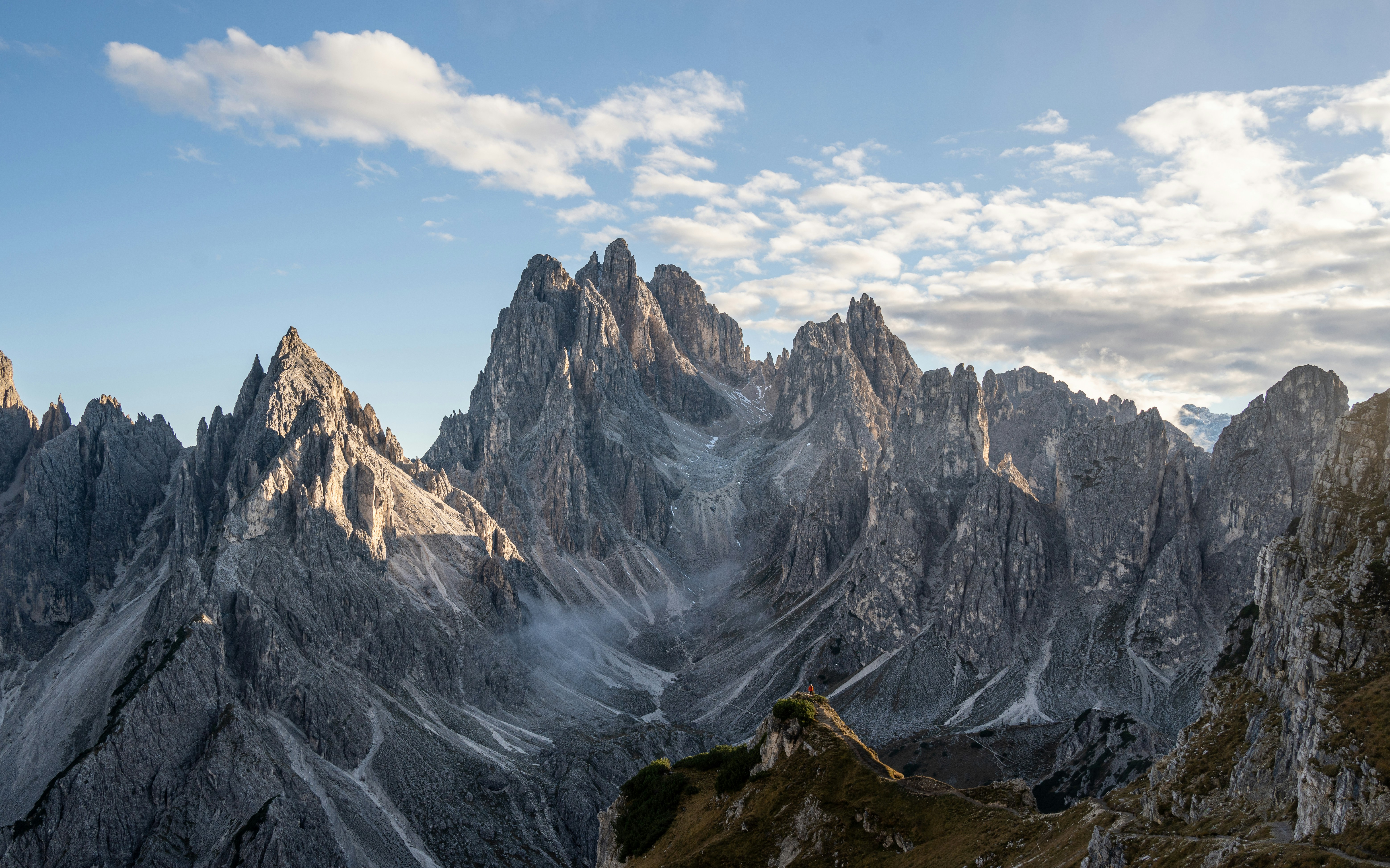 Jagged mountain peaks under a cloudy sky