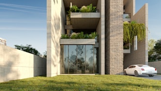 Modern building with glass entrance and balconies