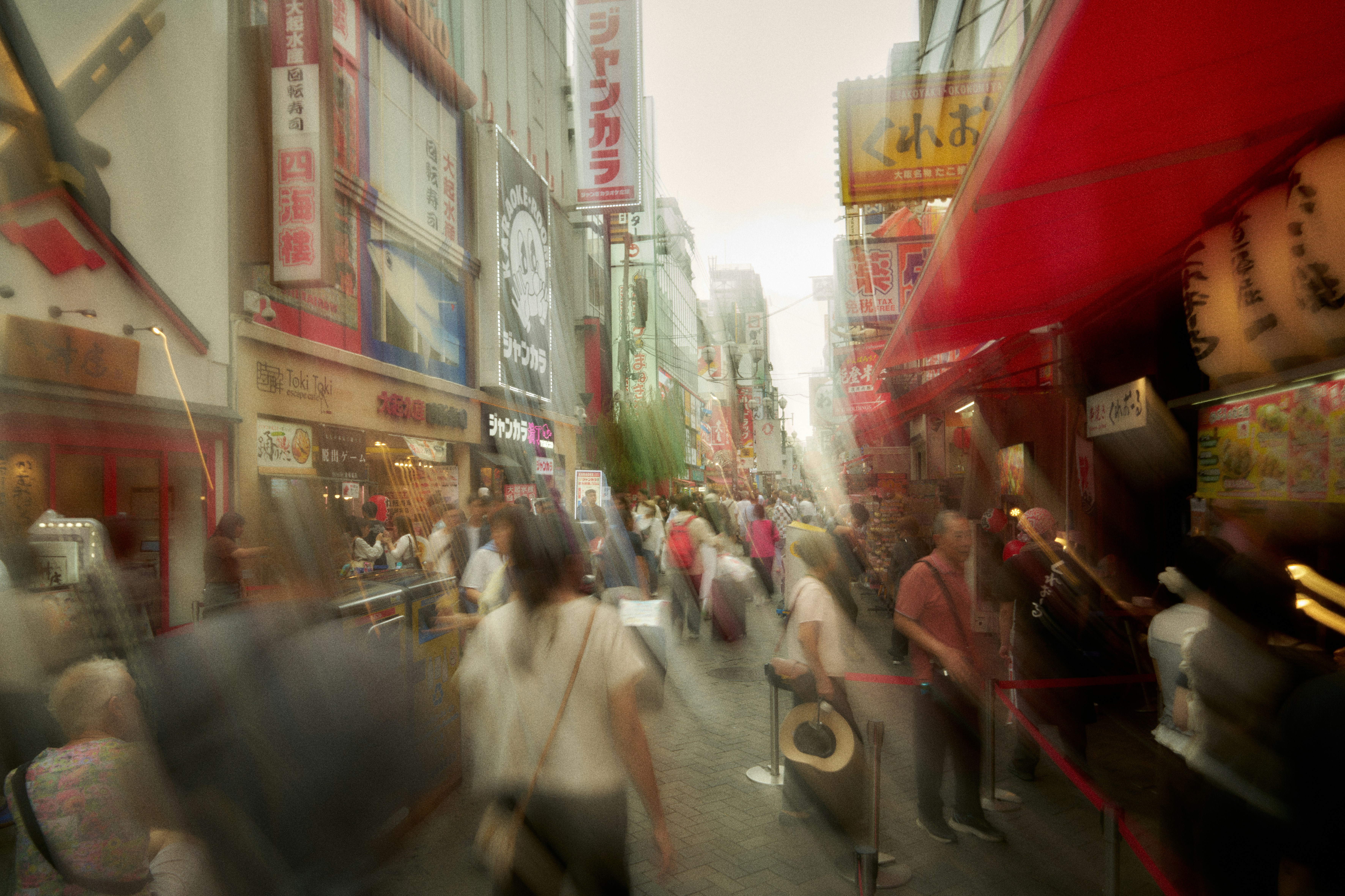 Blurred street scene with crowds