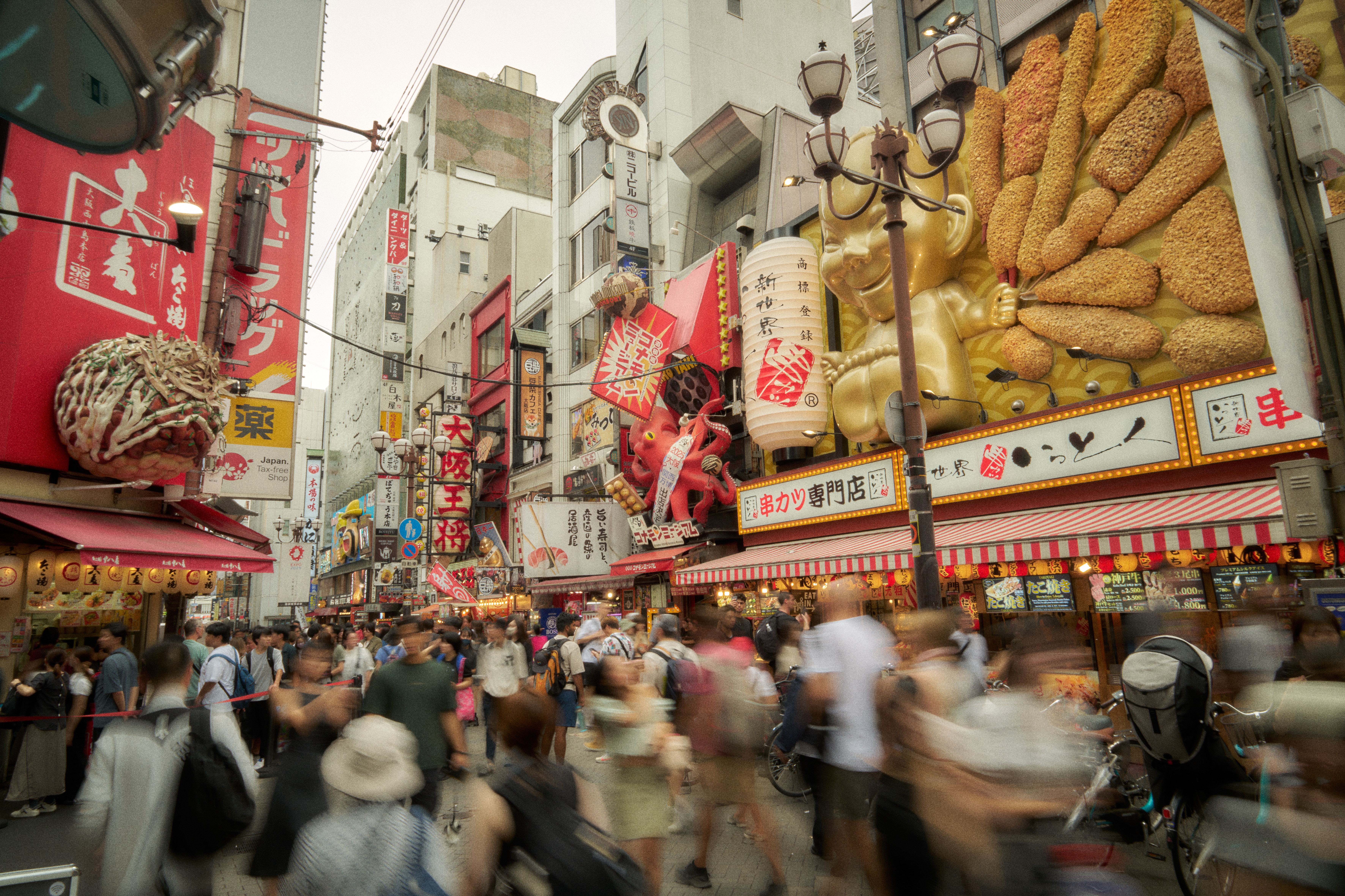 Busy street scene in a japanese city at night