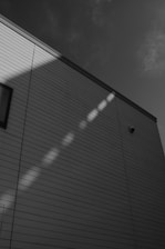 Building exterior with sunlight reflections on wall