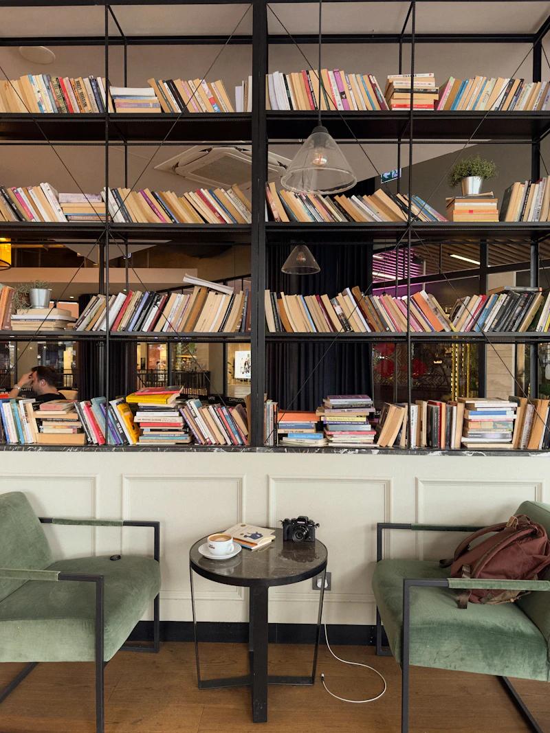 Sunlit library lounge with reading nooks