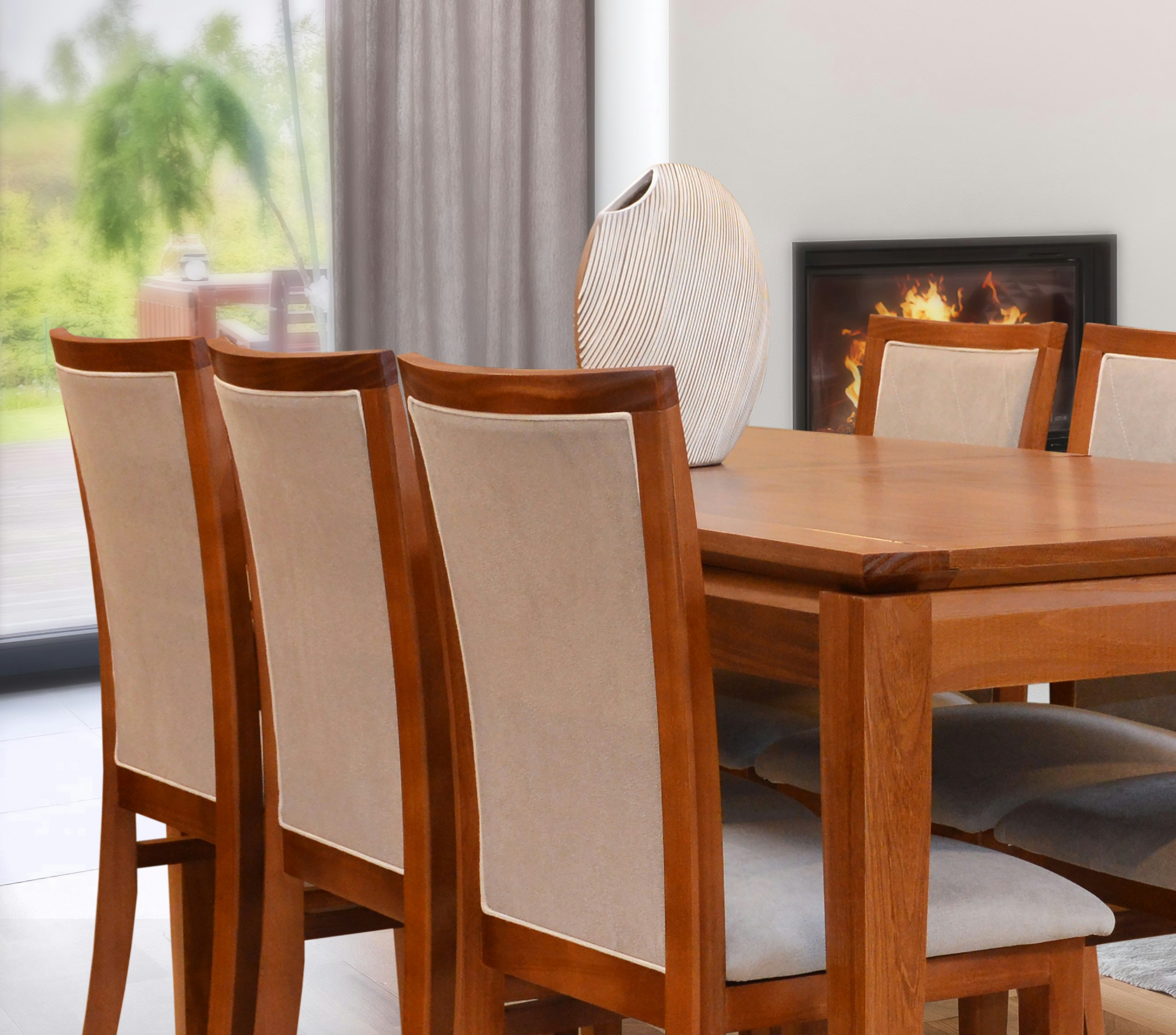 Dining room with wooden table and upholstered chairs