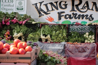 Fresh organic produce displayed at king ranch farms stand.