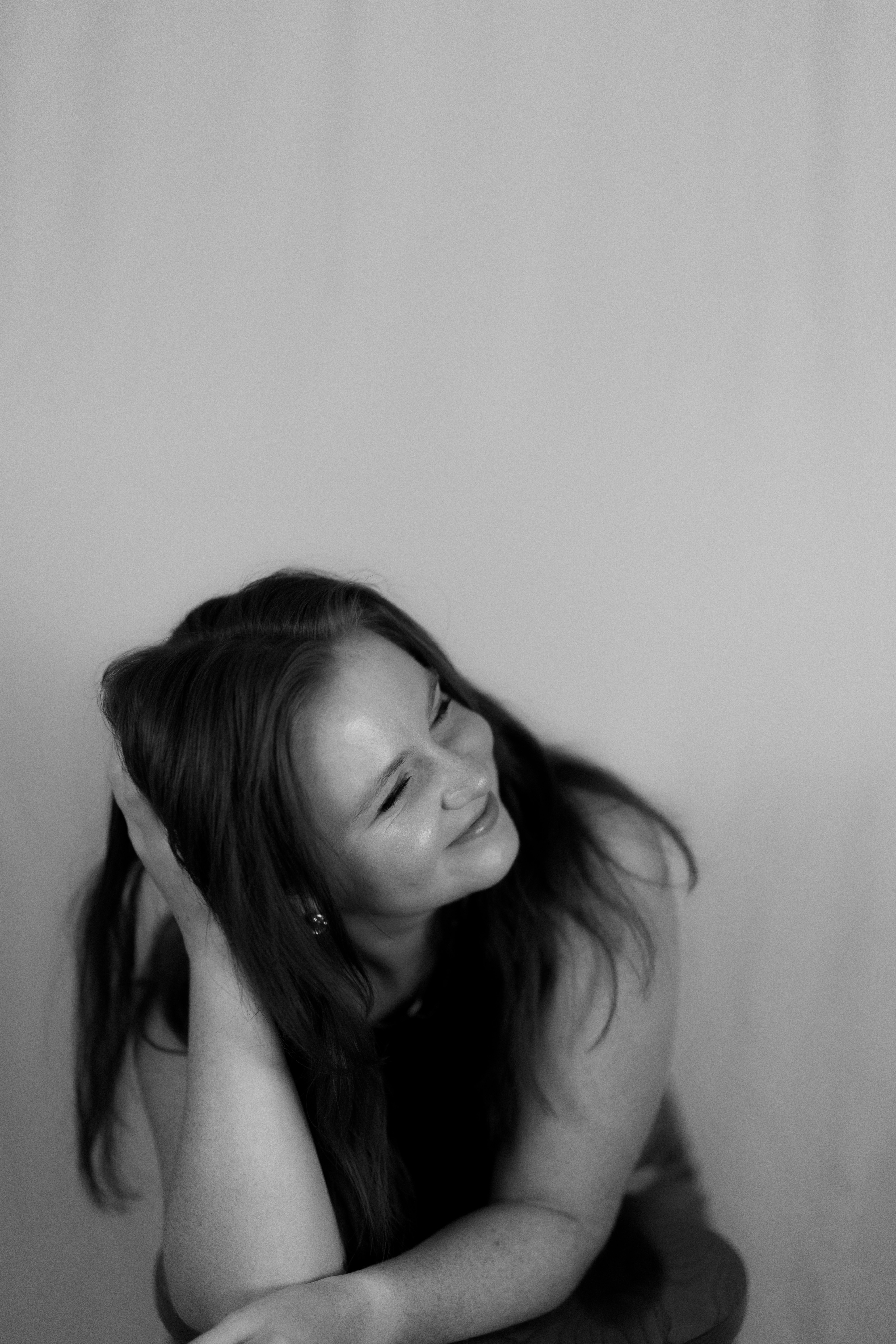 Black and white portrait of a smiling woman