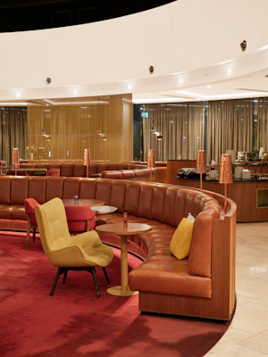 Passengers relaxing in a modern airport lounge
