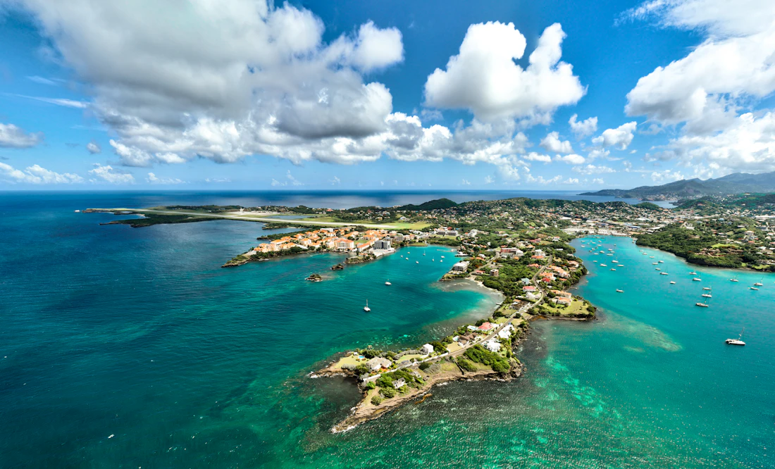 Aerial view of a Caribbean coastal town and bay
