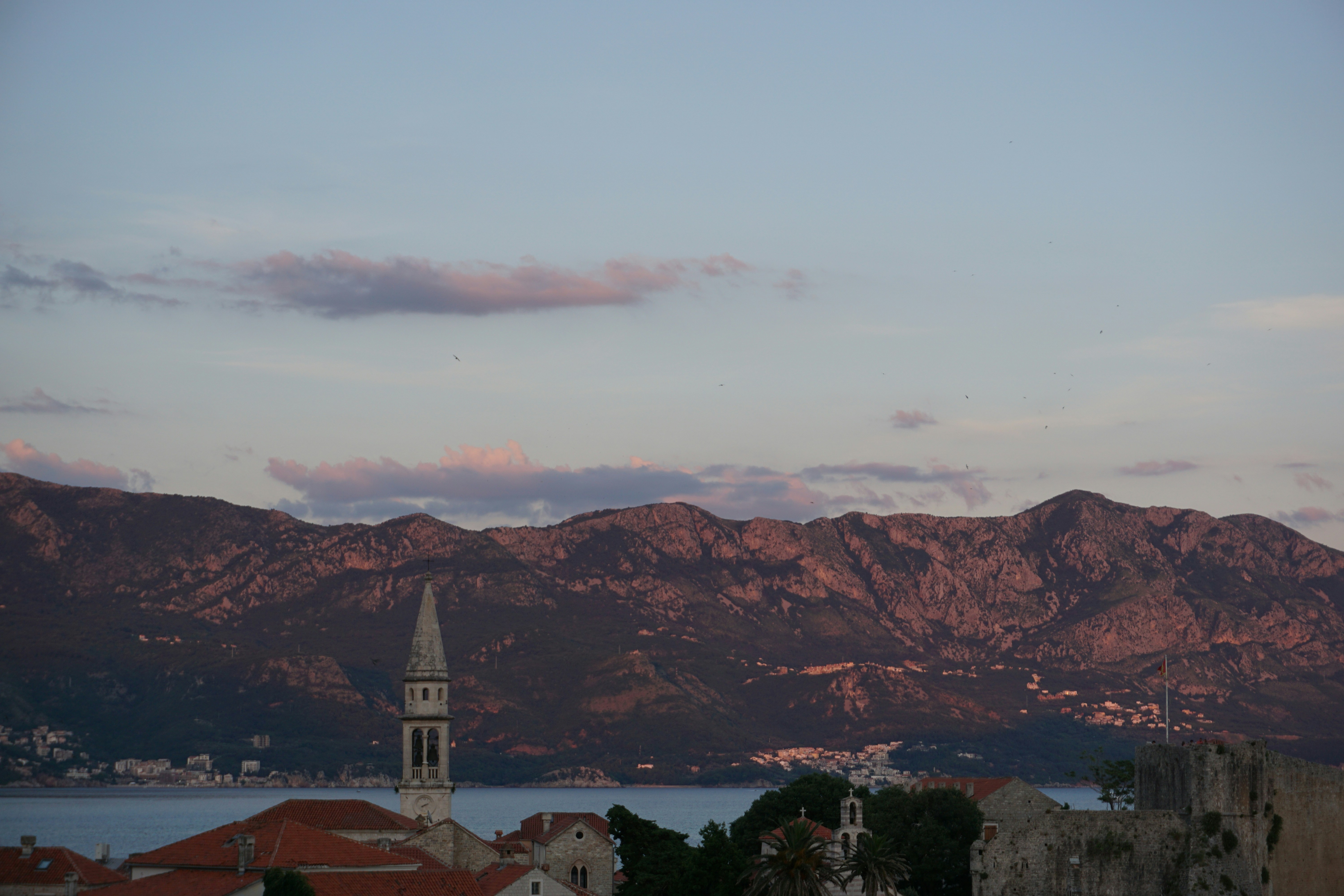 Mountains and coastal town at dusk