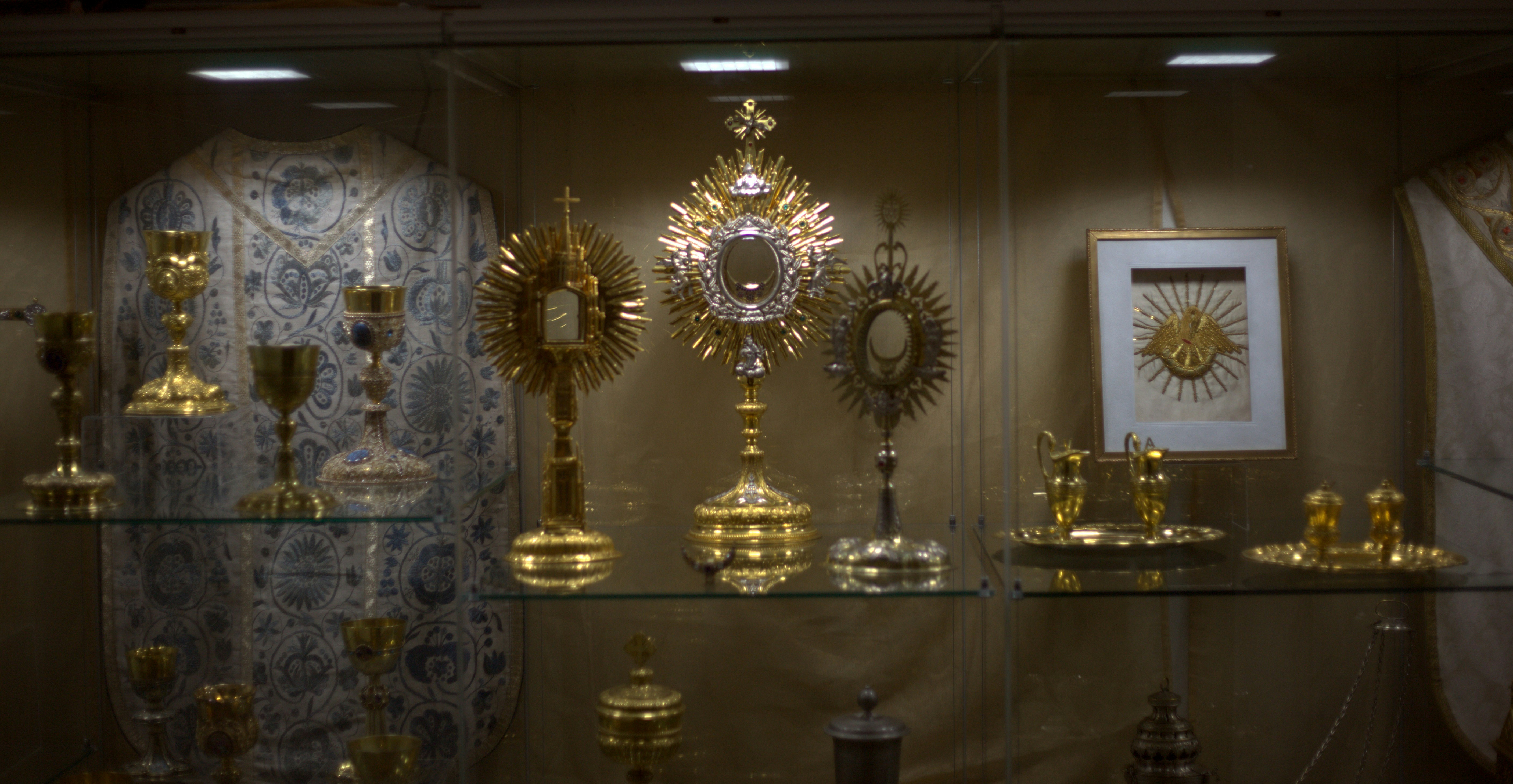 Religious artifacts displayed in a museum exhibit.