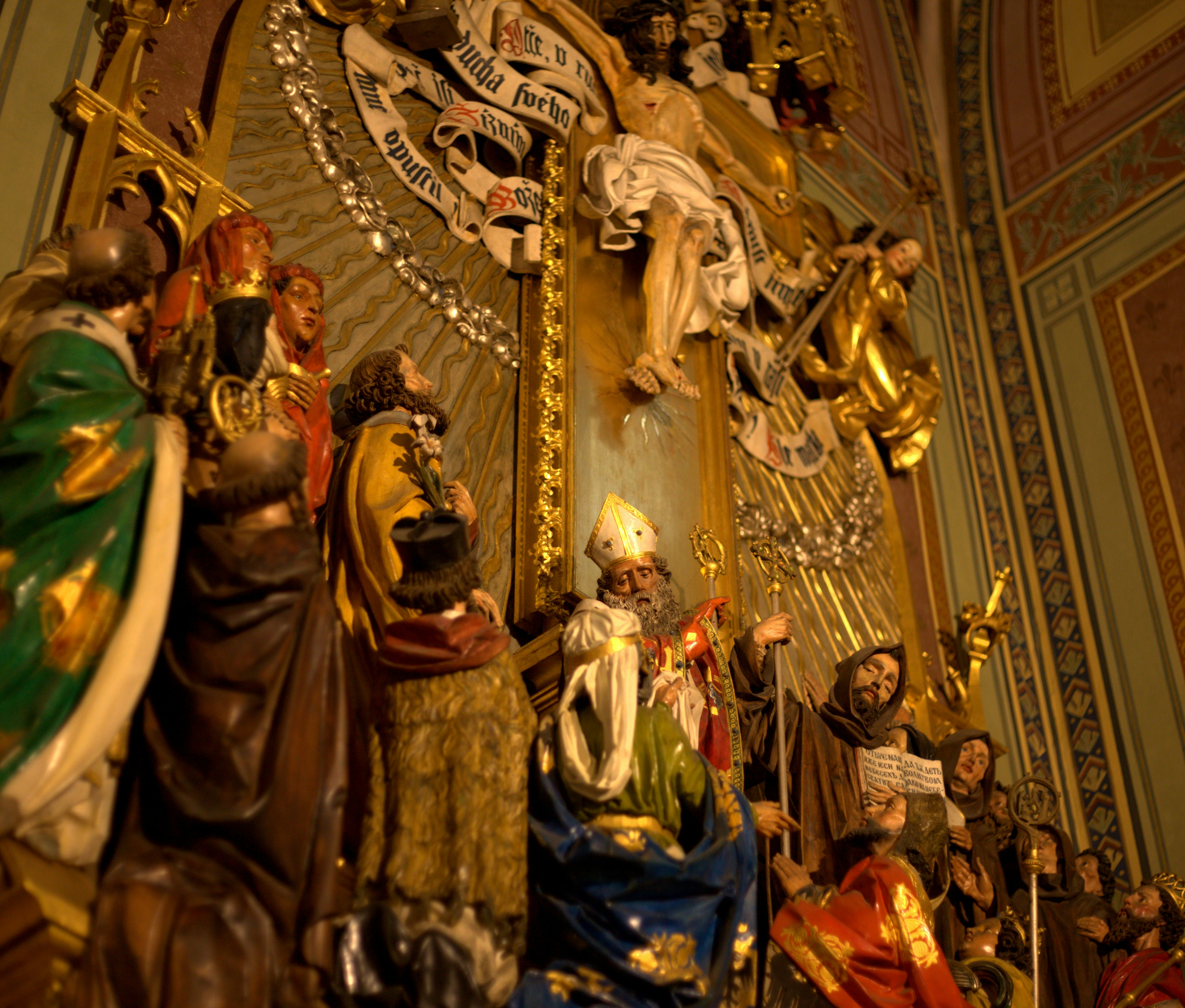 Ornate religious statues depicting christ and saints