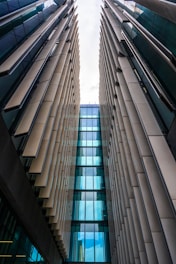 Modern glass buildings viewed from below