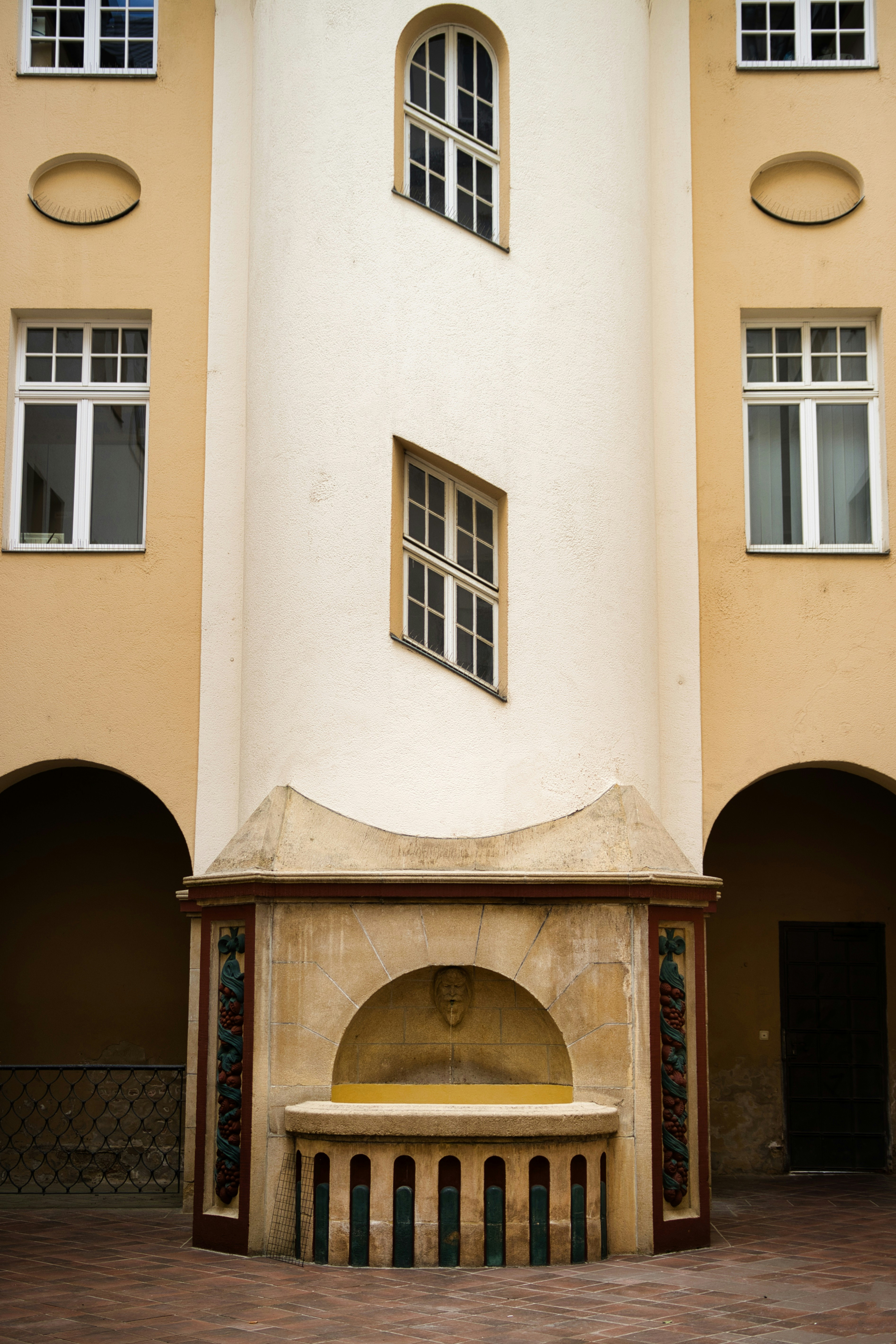 Architectural detail with arched doorways and windows