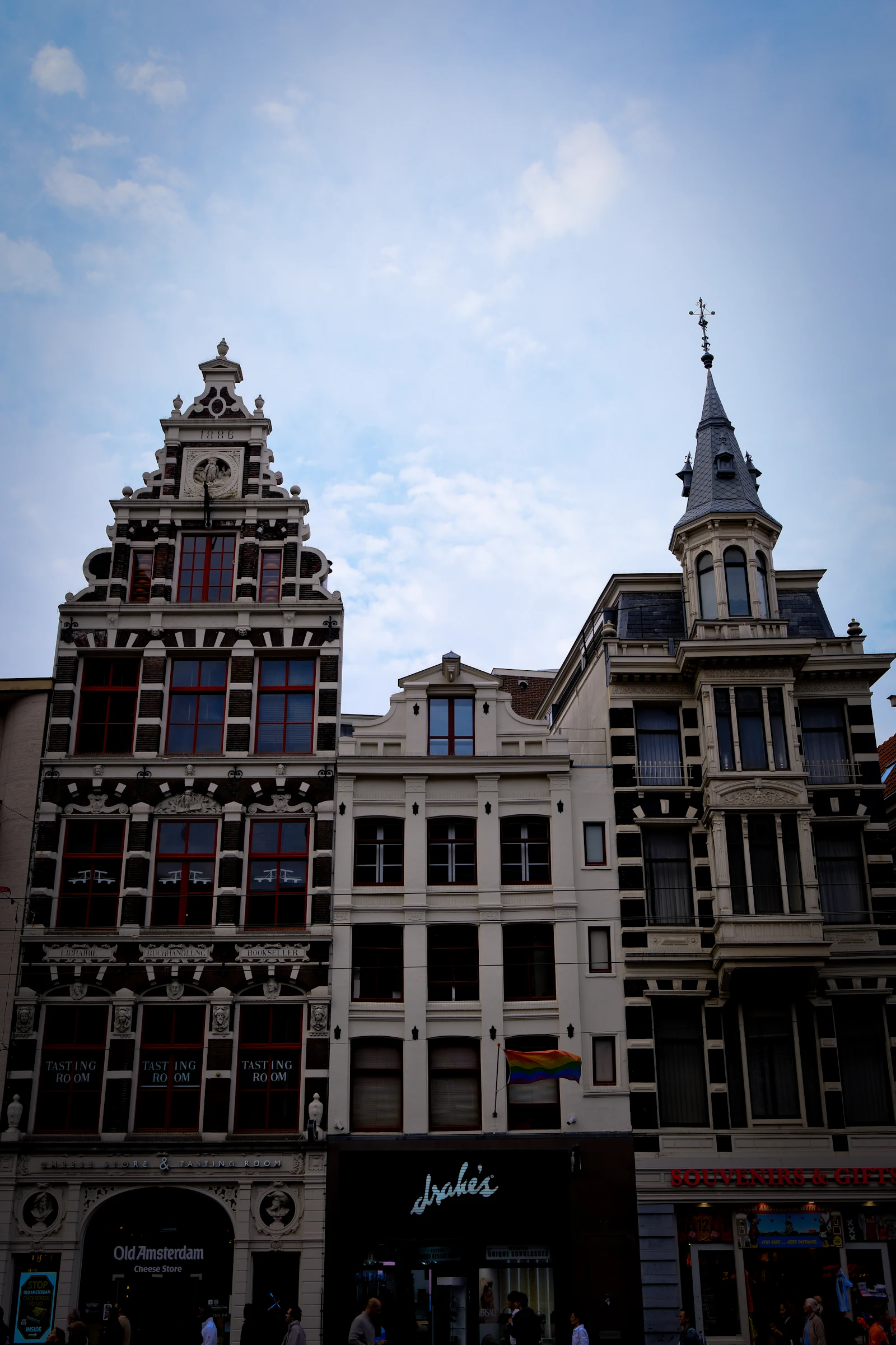 Ornate historic building facade under a cloudy sky