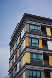 Modern building with colorful geometric accents under sky