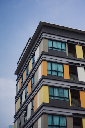 Modern building with colorful geometric accents under sky