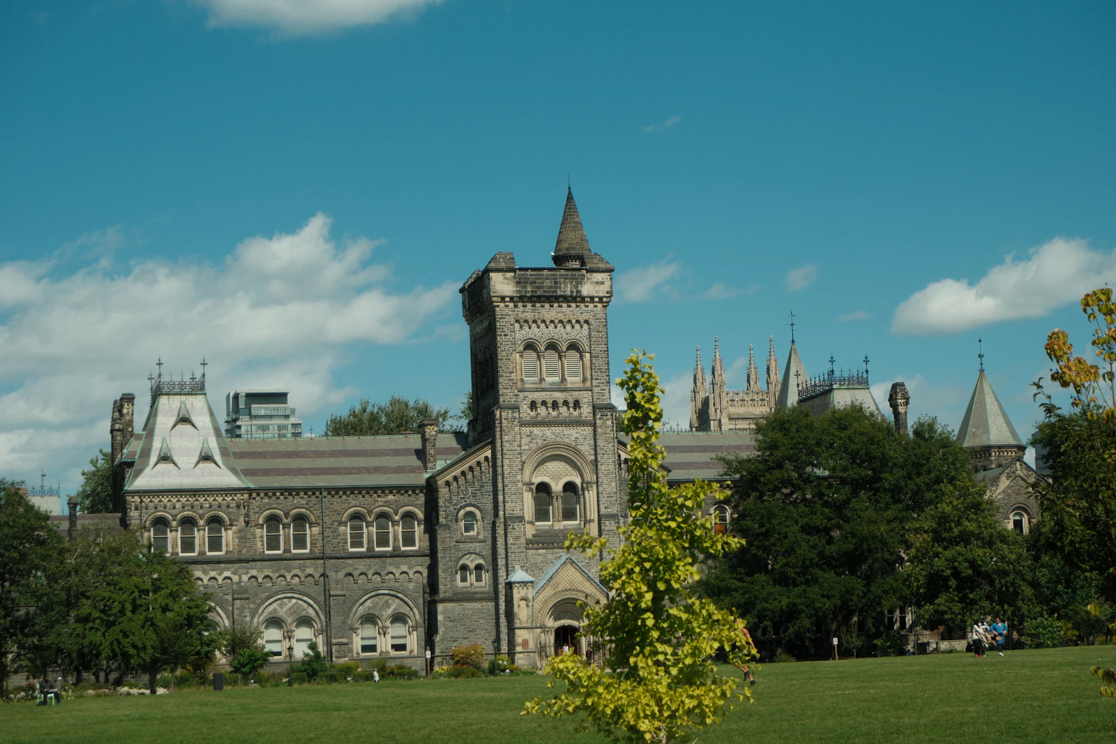 Gothic stone building and lawn at King's College Circle, University of Toronto, Canada