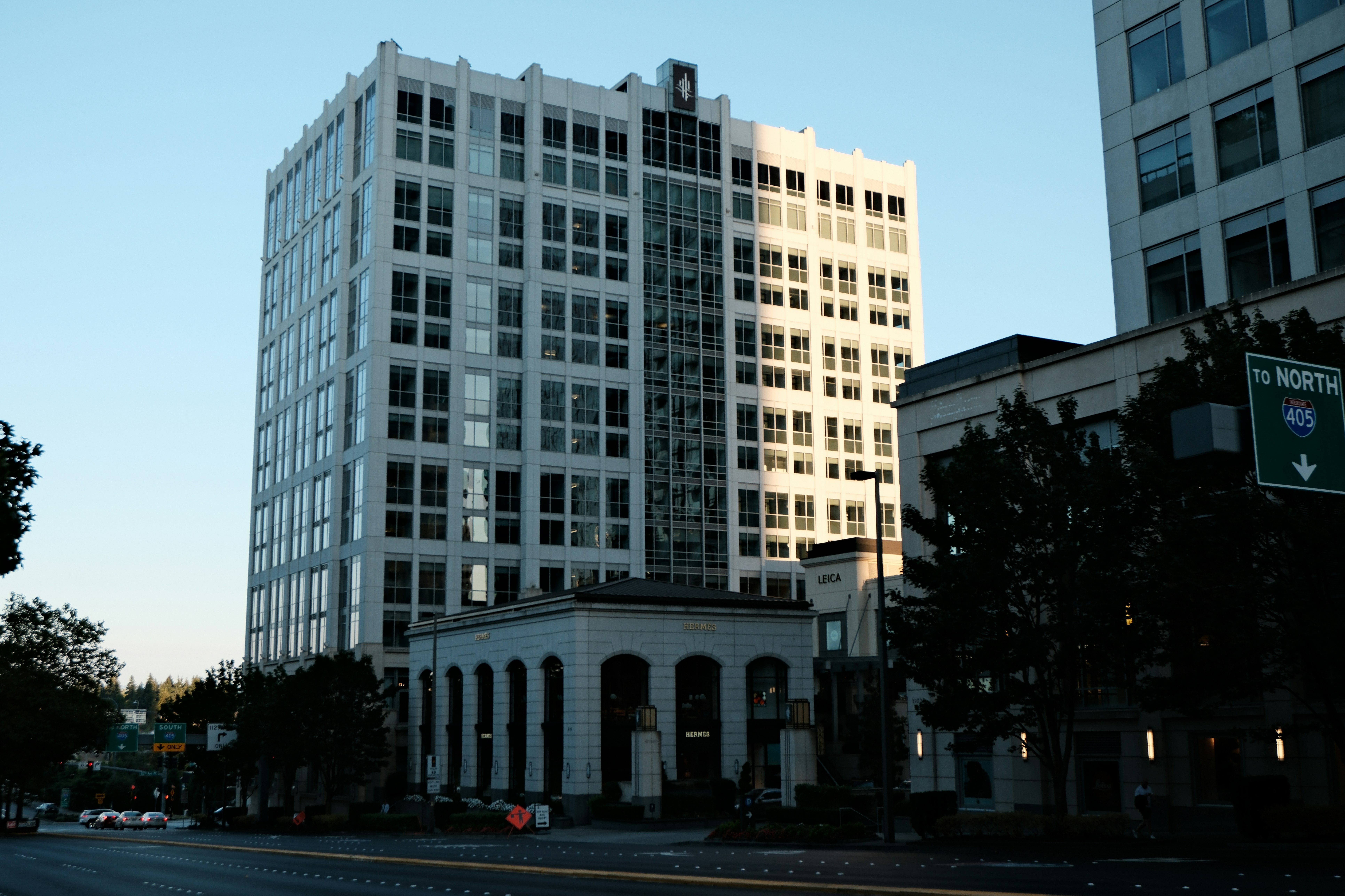 Modern white office building against clear sky