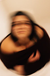 Blurred portrait of a woman looking upwards