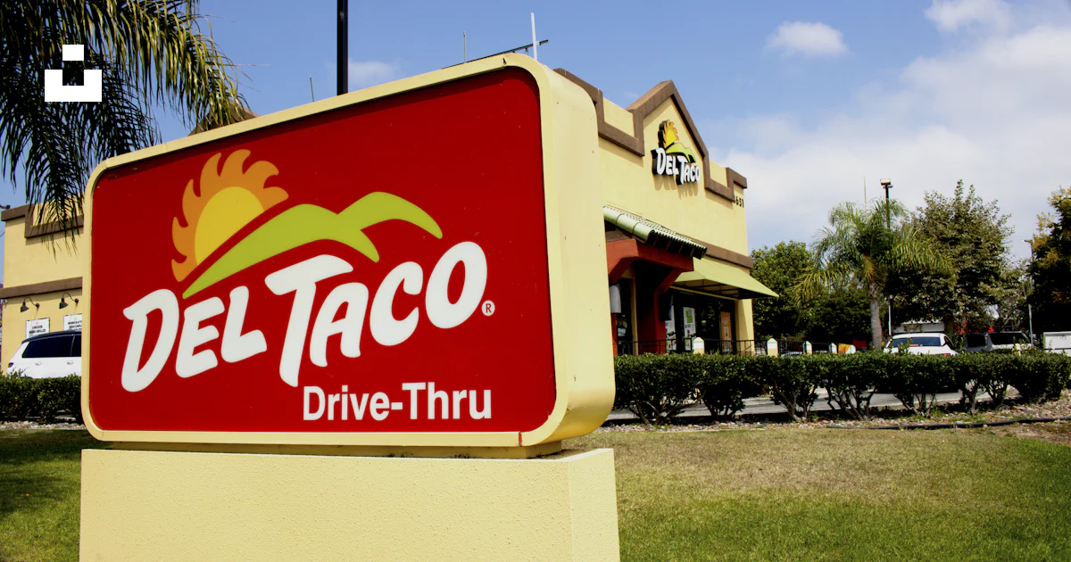 Delta Co Sign Deltaco restaurant exterior with a large sign. photo – Free Blue Image ...