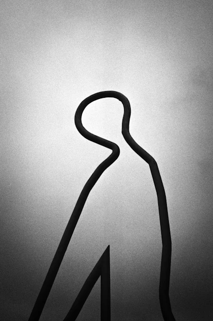 Abstract outline of a person against a gradient background