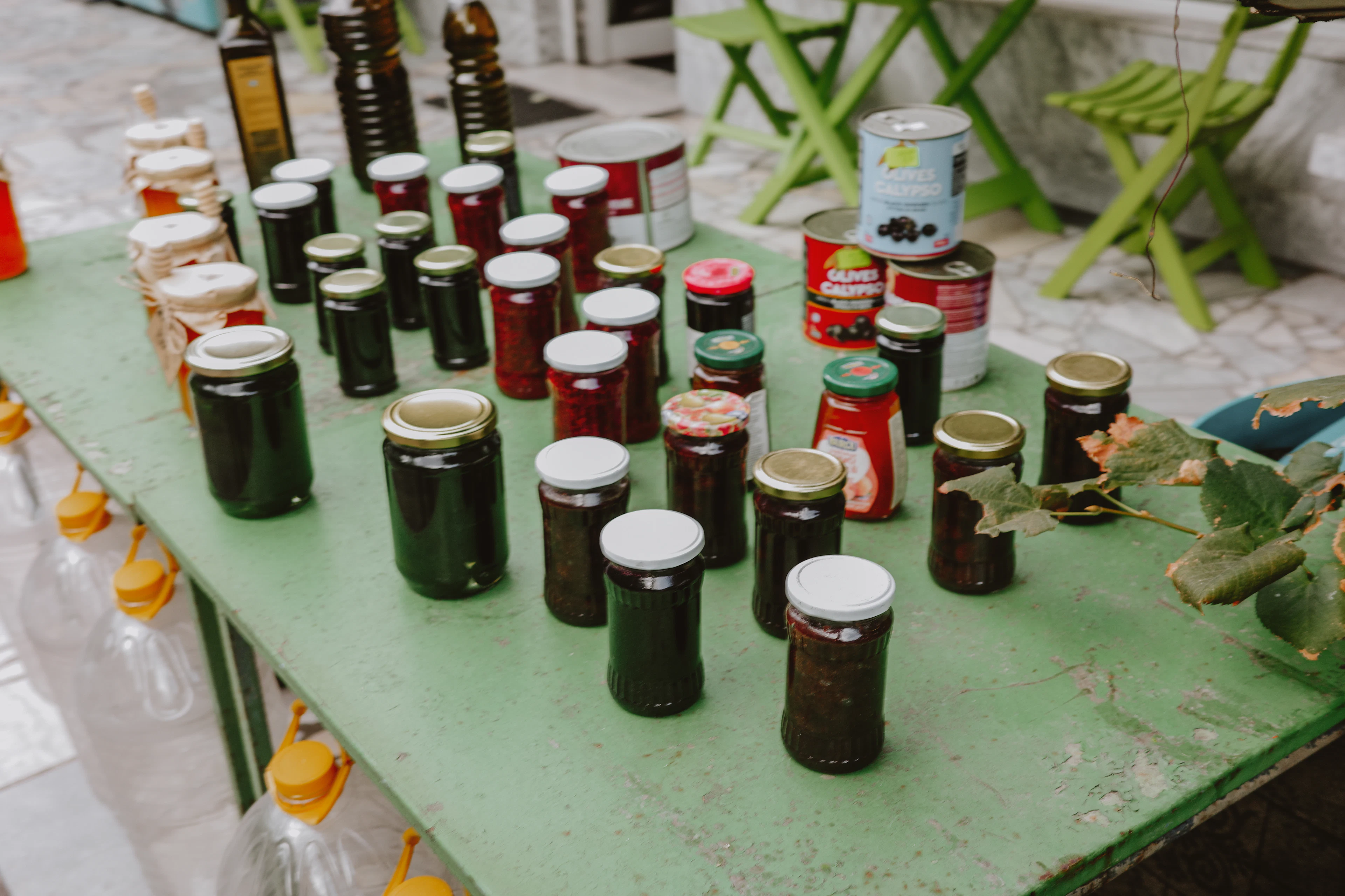 Jars of preserves and bottles of oil