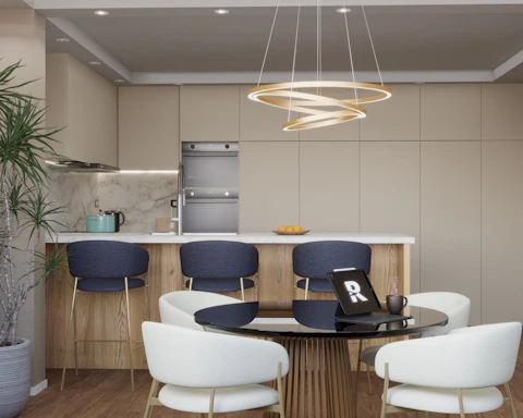 Modern kitchen island with bar stools and dining area.