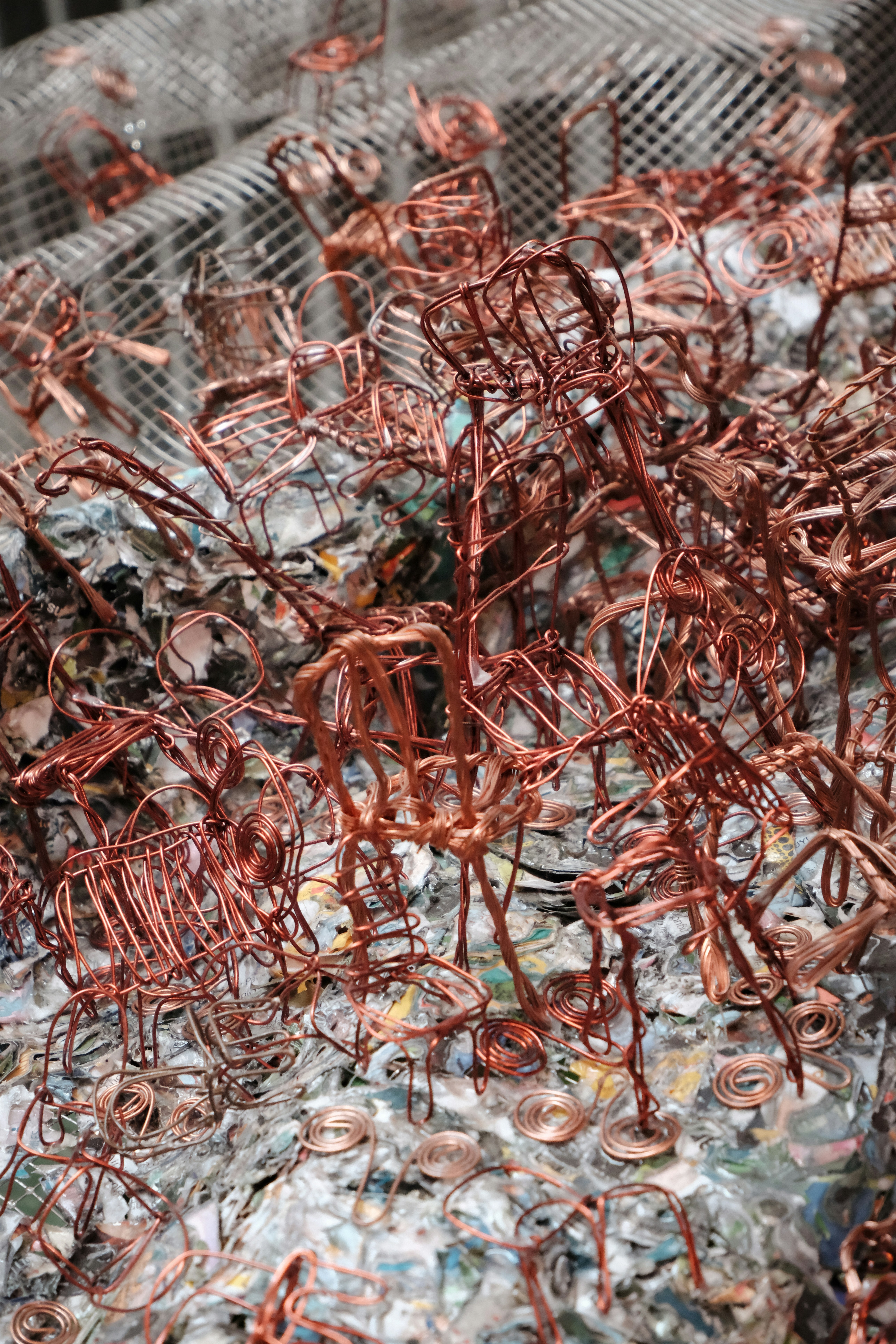 Wire sculptures resembling trees and plants