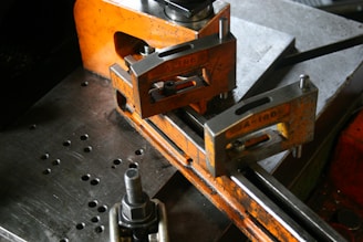 Industrial metal clamps on machinery