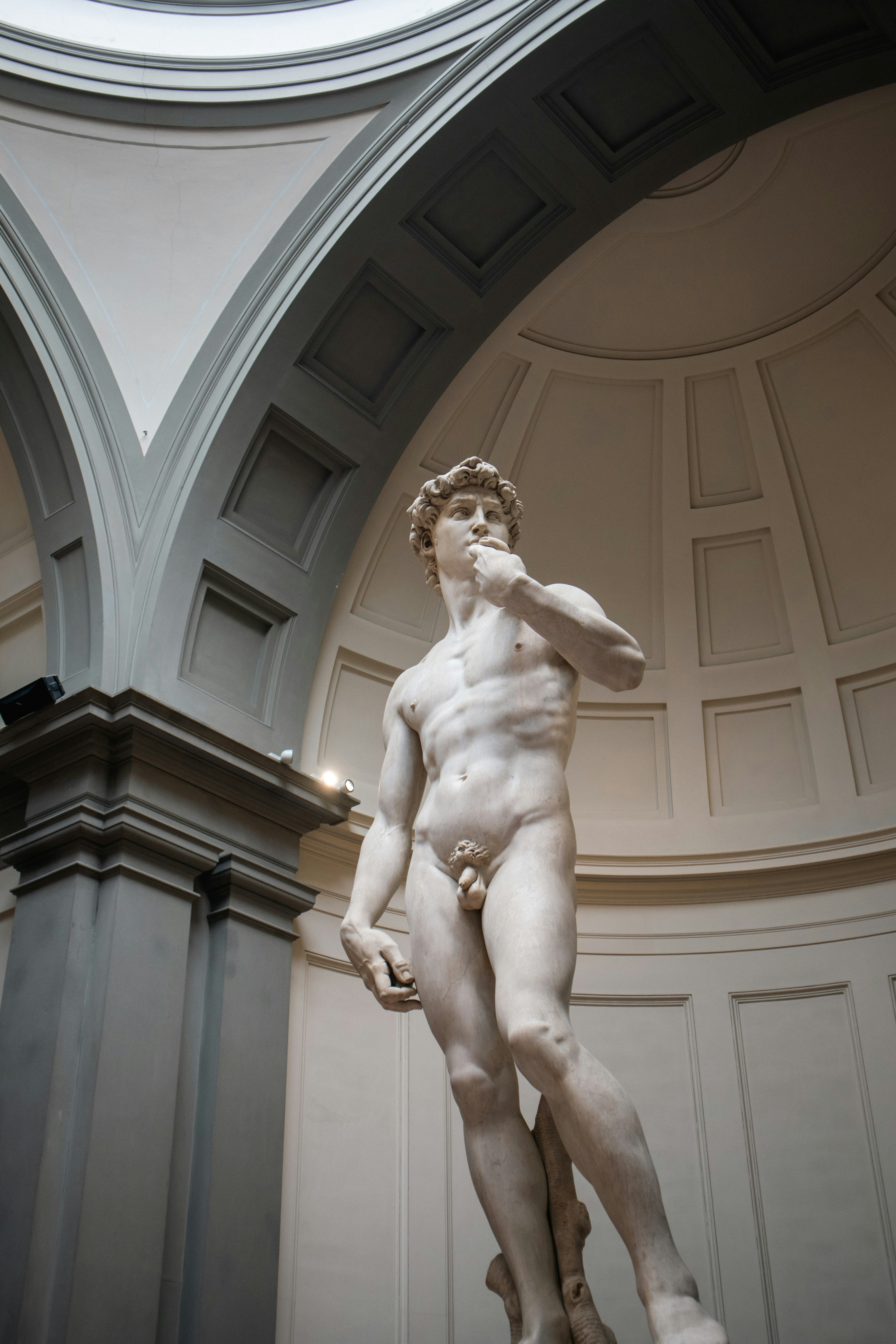 Marble statue of a muscular male figure