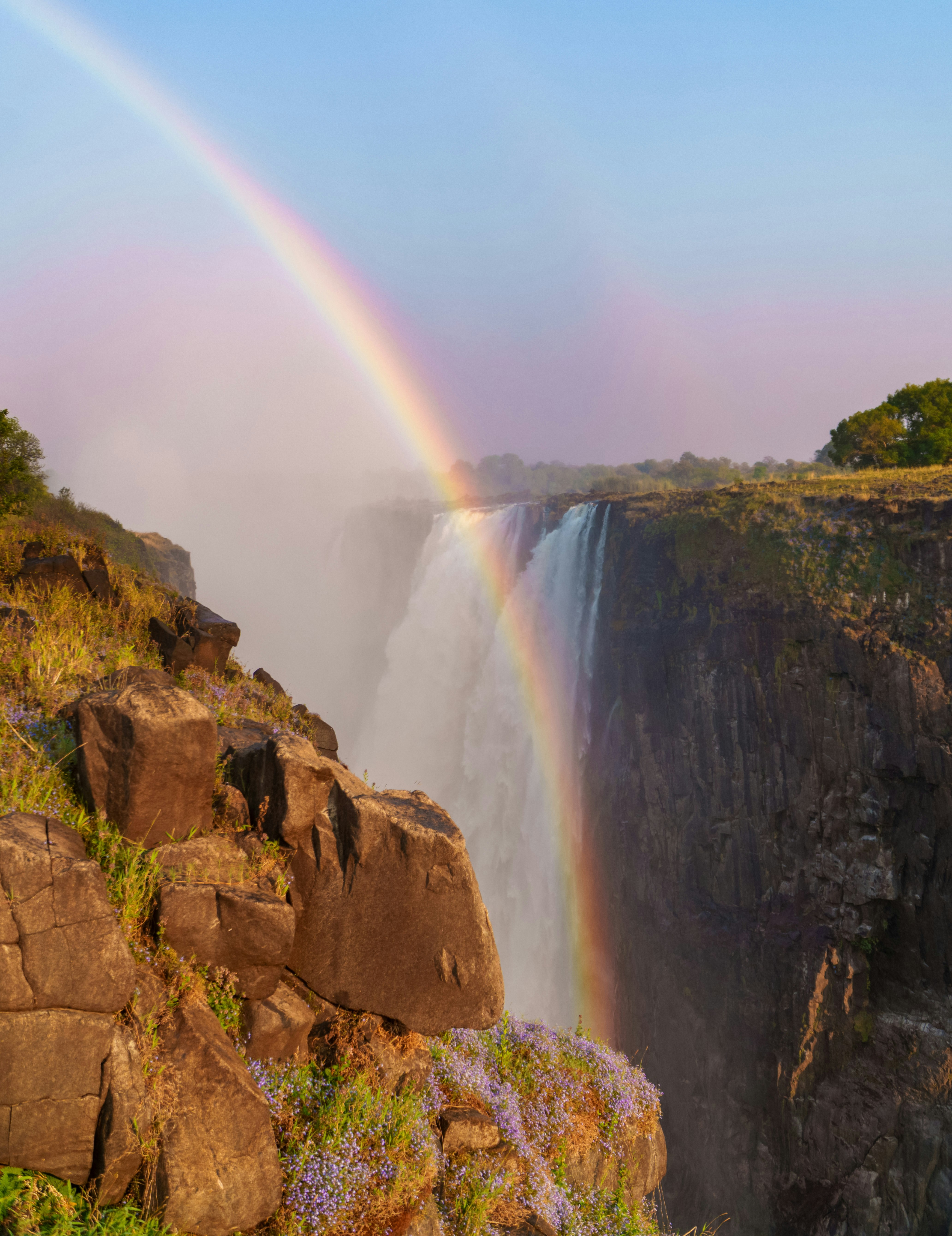 Victoria Falls with rainbow in the background