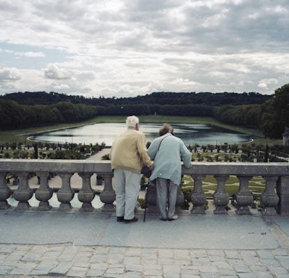 Retired couple enjoying a garden in France