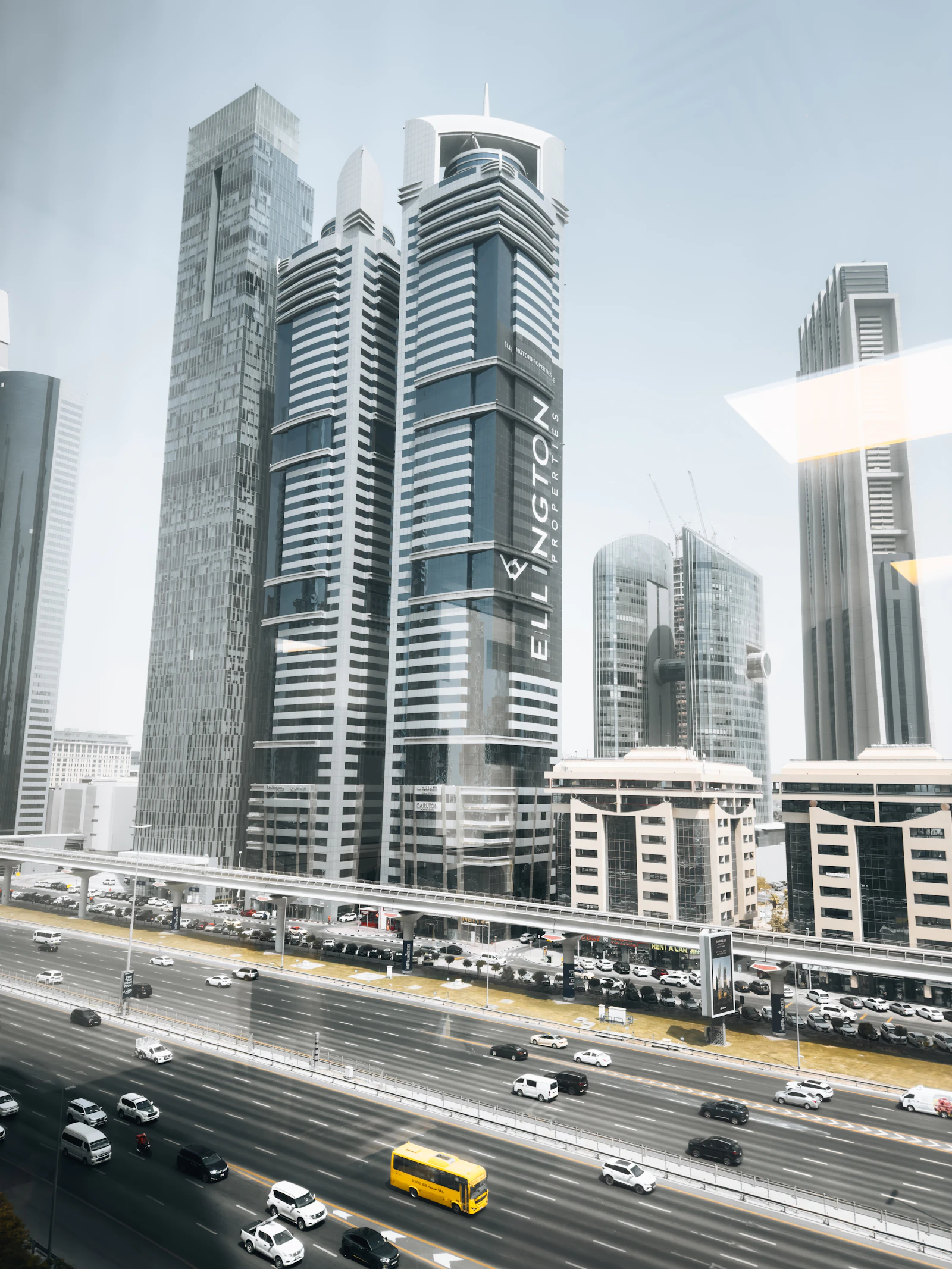 Sheikh Zayed Road skyscrapers and traffic showing Dubai's mainland commercial corridor