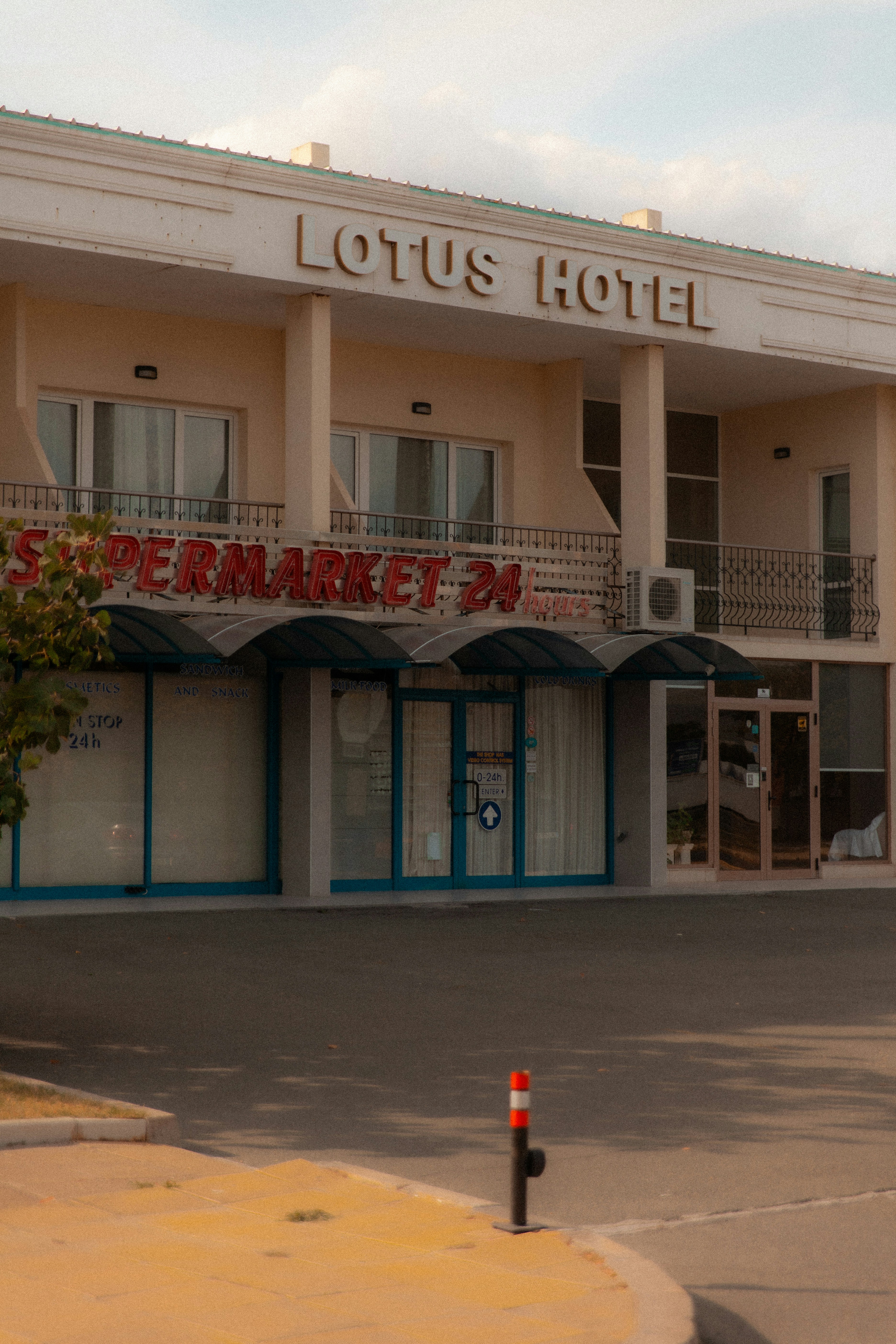 Lotus hotel and supermarket 24 storefront