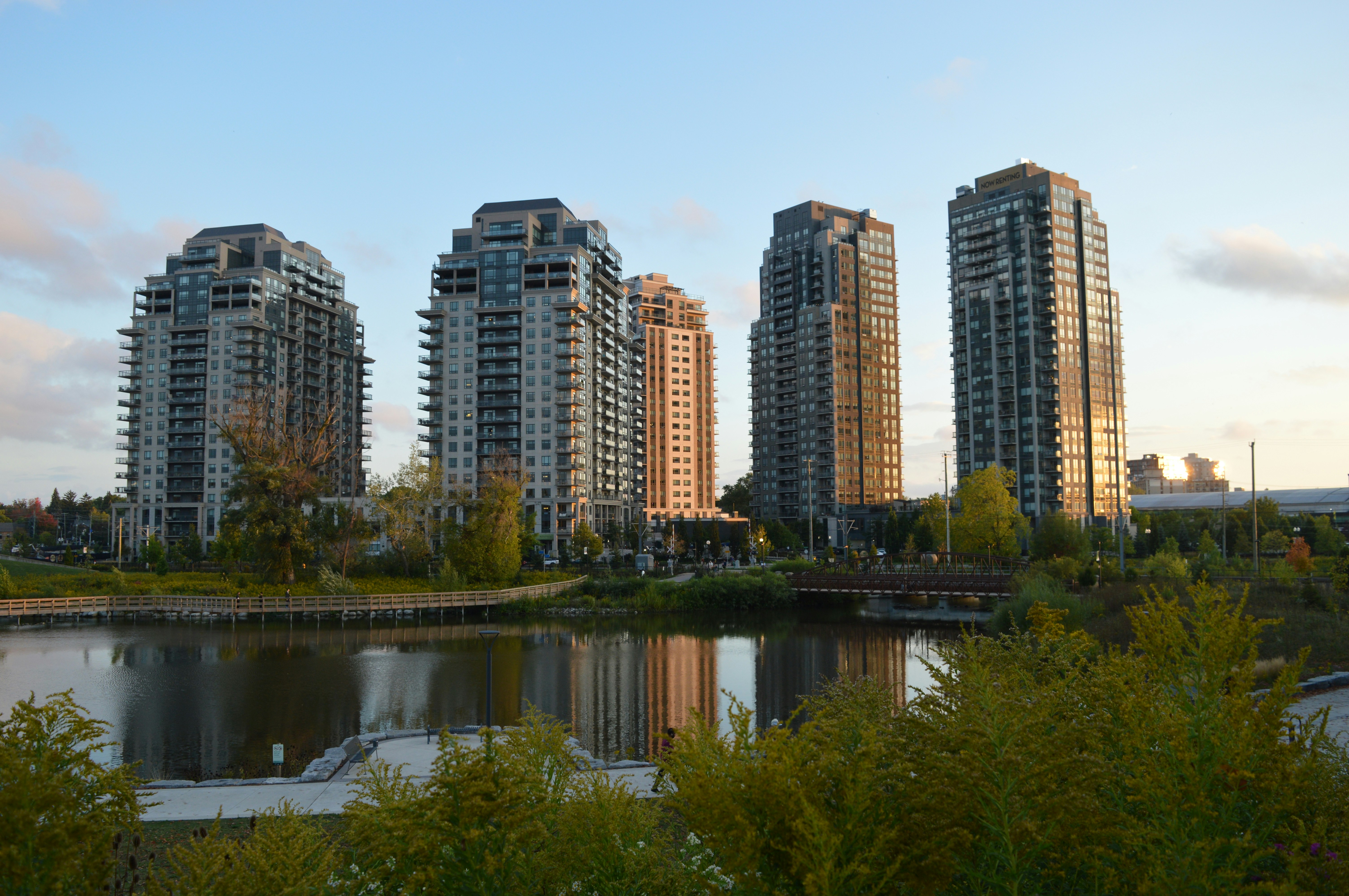 Overlooking Silver Lake in Waterloo Park, Ontario, Canada, with The Barrel Yards apartment complex in the backdrop.