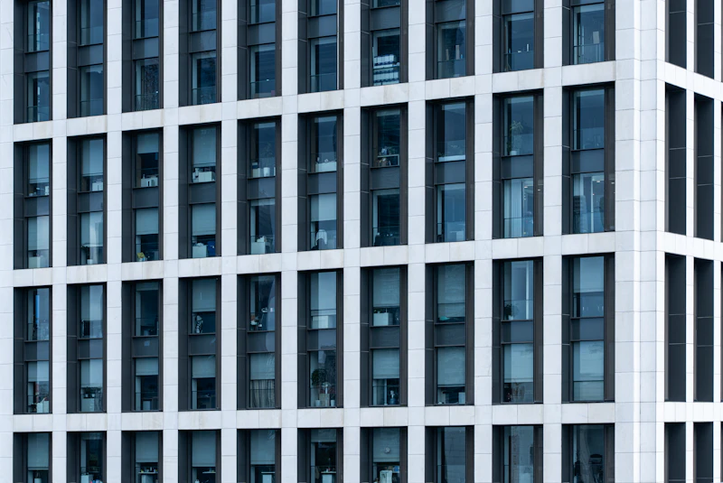 Office building facade with repeating windows across several floors