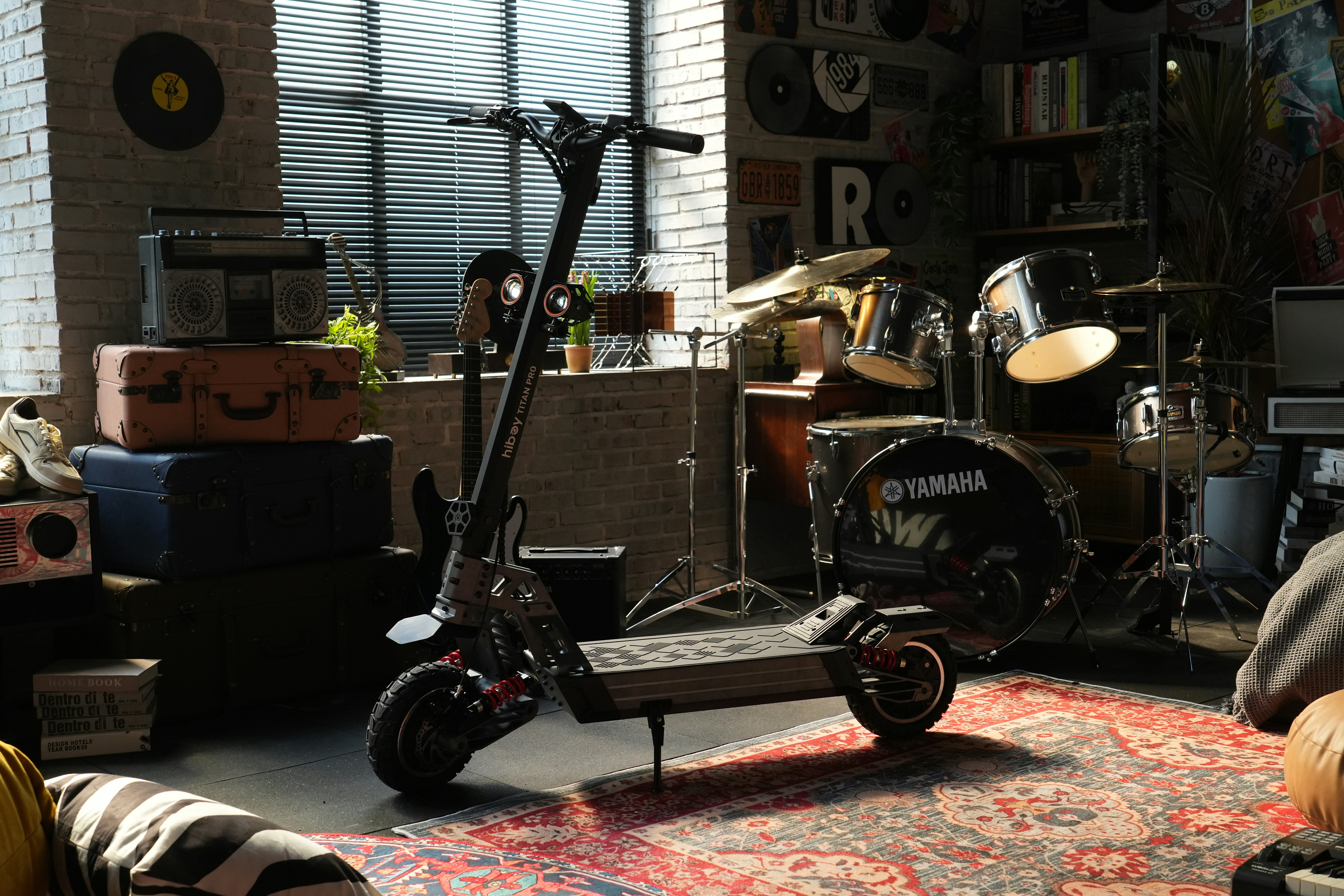 Electric scooter in a room with musical instruments.