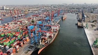 Busy shipping port with cranes and cargo containers