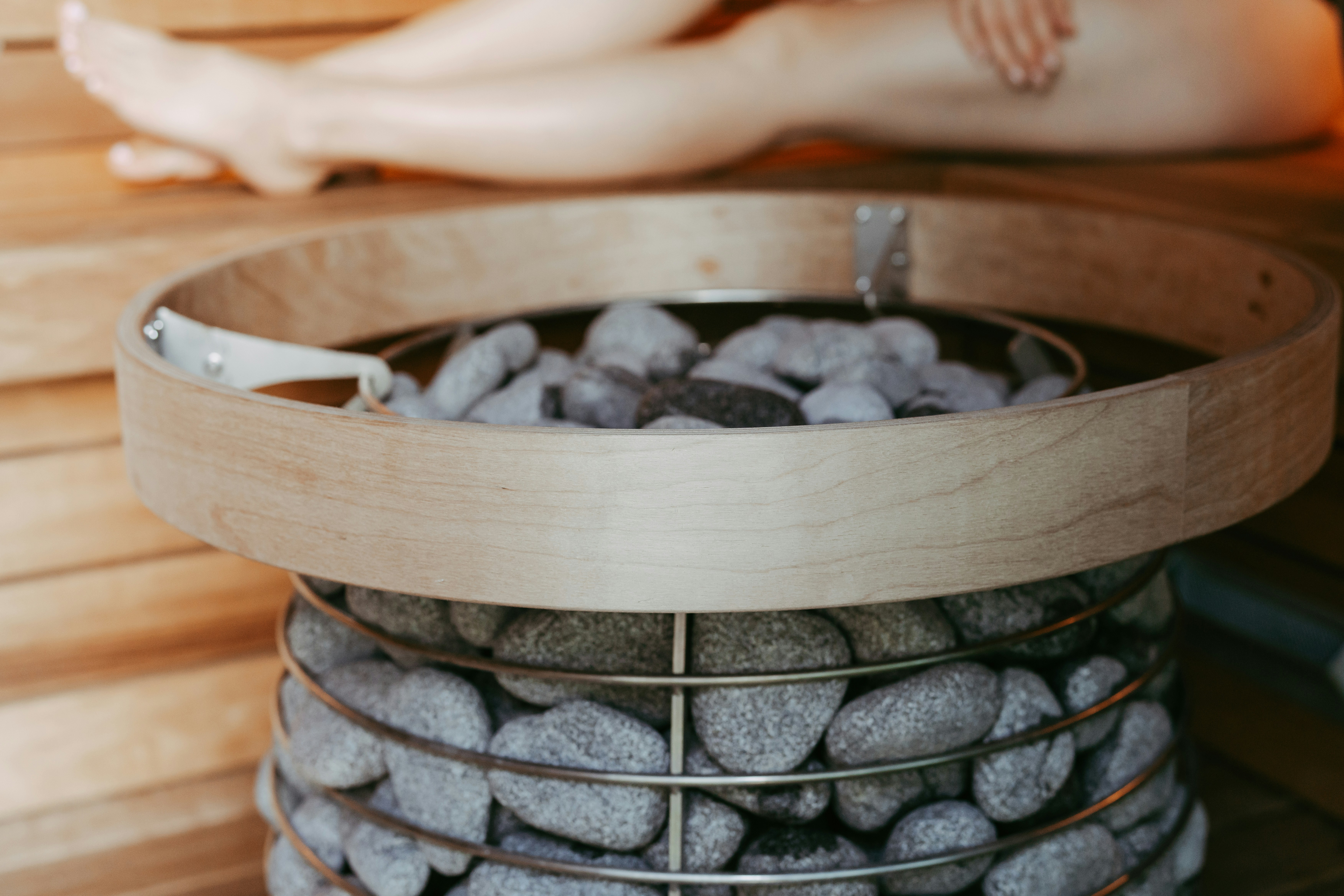 Hot stones in a wooden sauna heater
