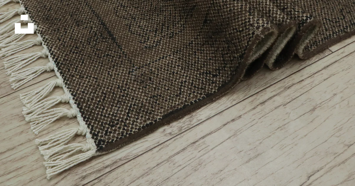 Fringe Rug Opacity Texture A textured brown rug with fringe on wooden floor photo – Free Texture ...