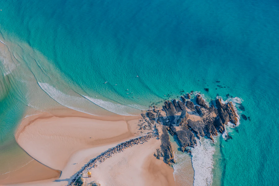 Aerial view of turquoise coastline water