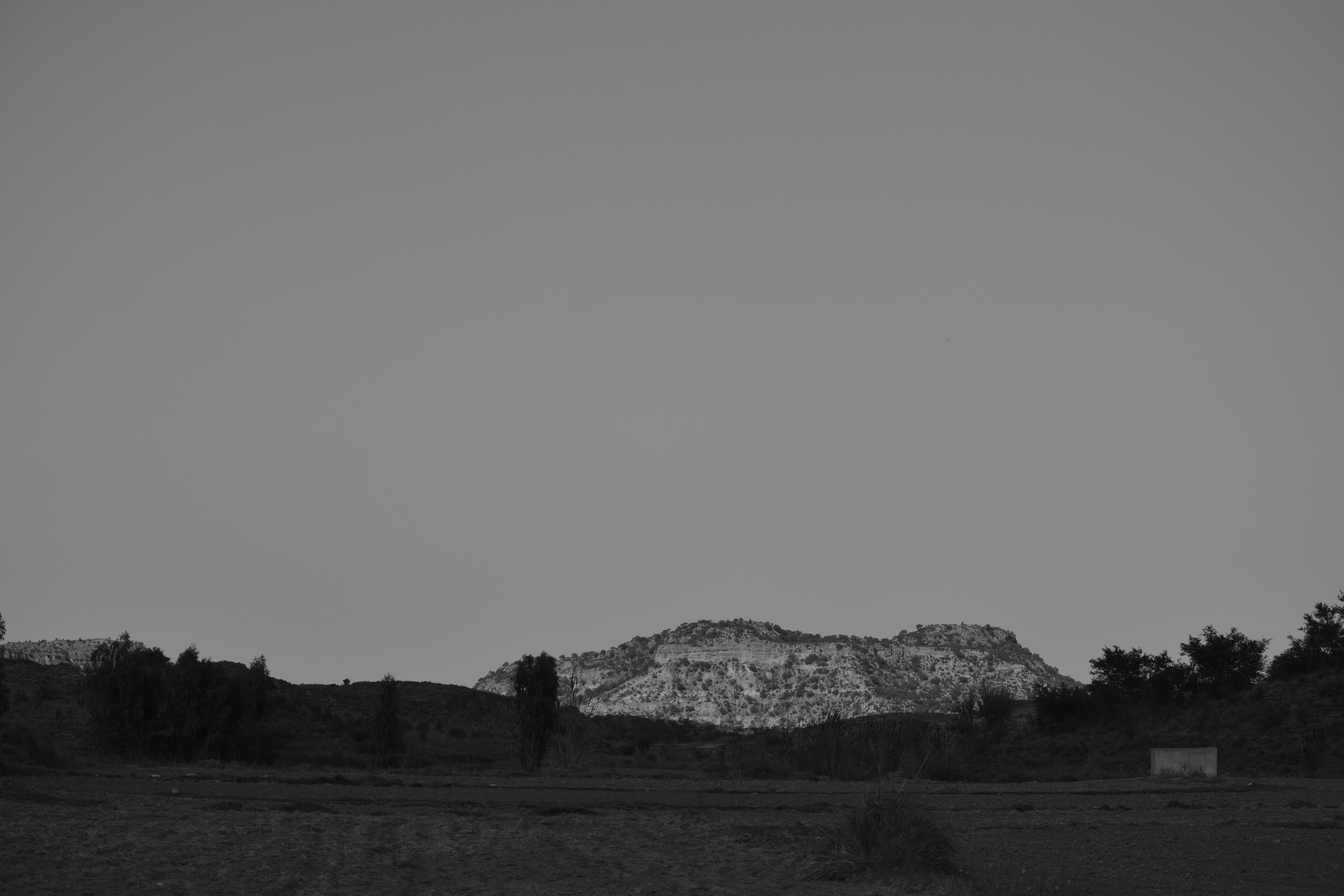 Distant mountain range under a clear sky