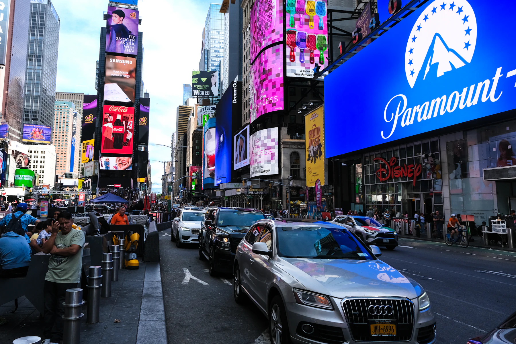 Times Square in New York with bright billboards and signs