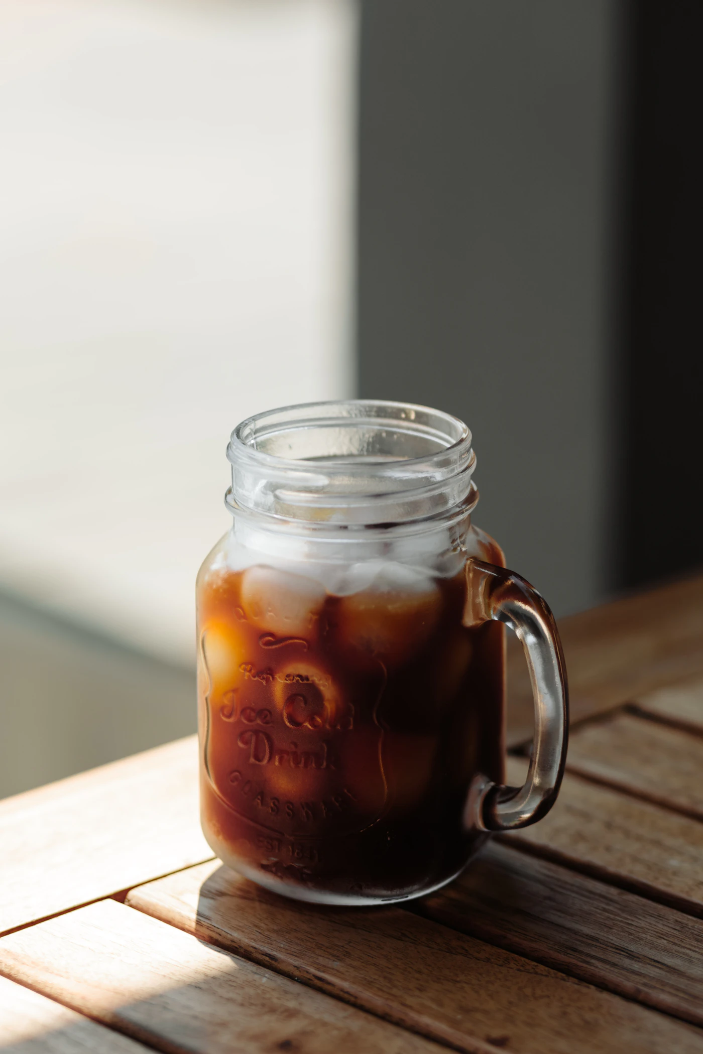 Cold brew coffee with glass on kitchen counter