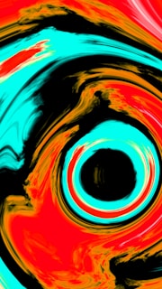 Abstract swirling pattern of black, red, and cyan colors.